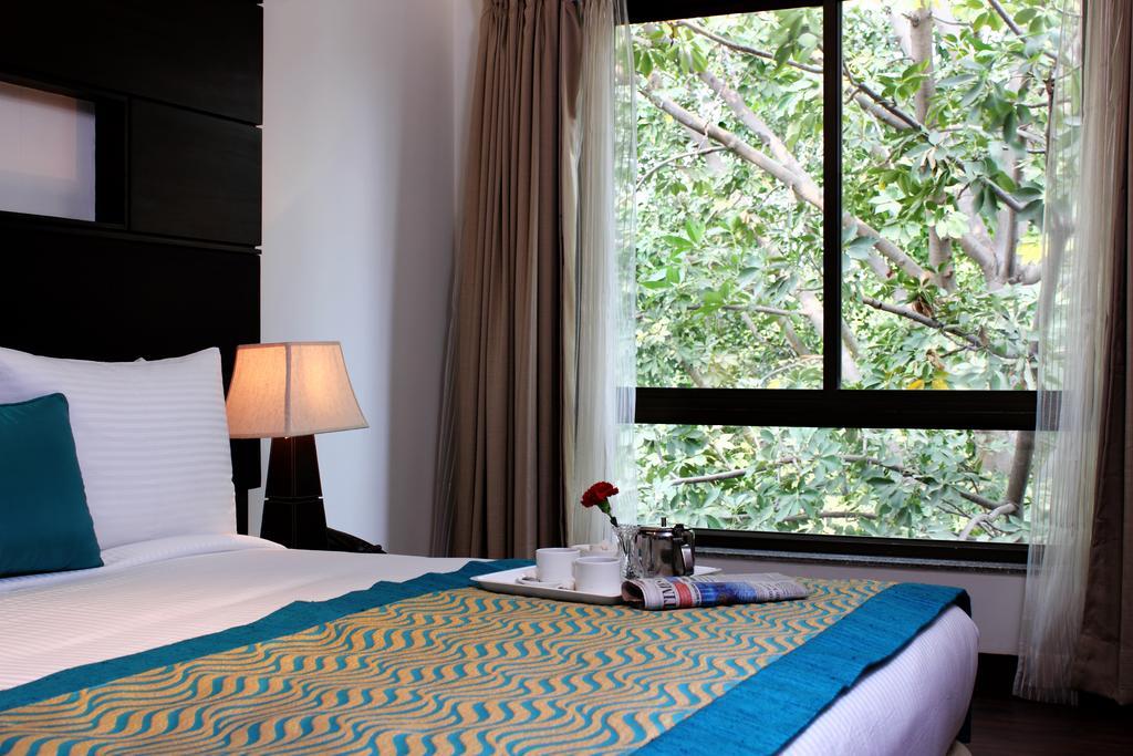 Stately Suites Mg Road Gurgaon Habitación foto